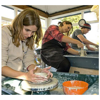 A
group of students enjoying their day in Sandy's pottery studio.